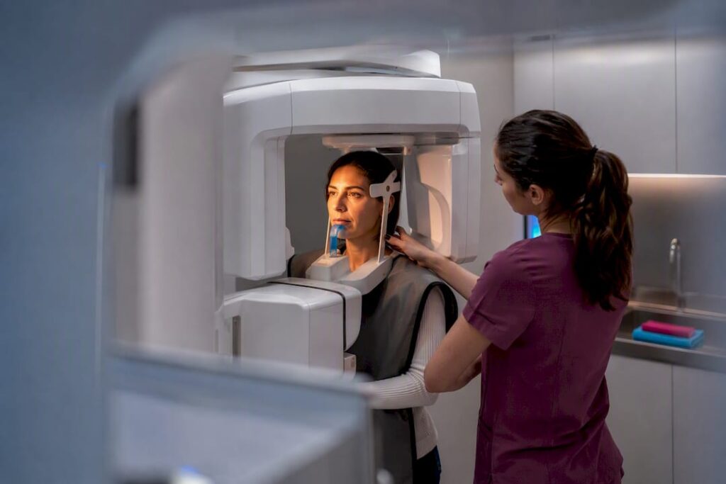 Patient undergoing 3D dental implant scan
